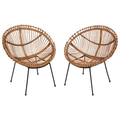 Vintage Pair of Midcentury Italian Rattan and Black Metal Shell-shaped Armchairs, 1950s