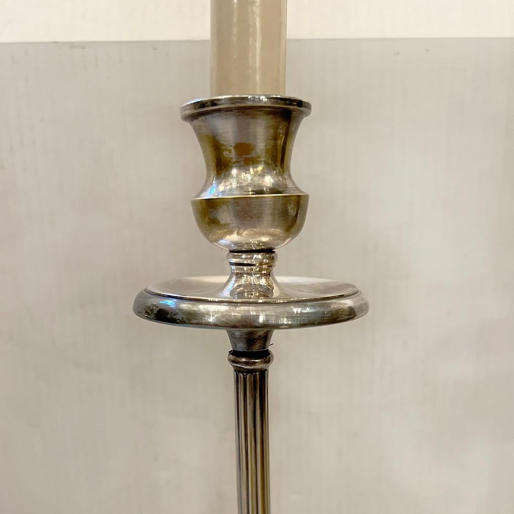 Pair of 1950's Italian silver plated lamps with 2 lights.

Measurements:
Height of body: 21.25