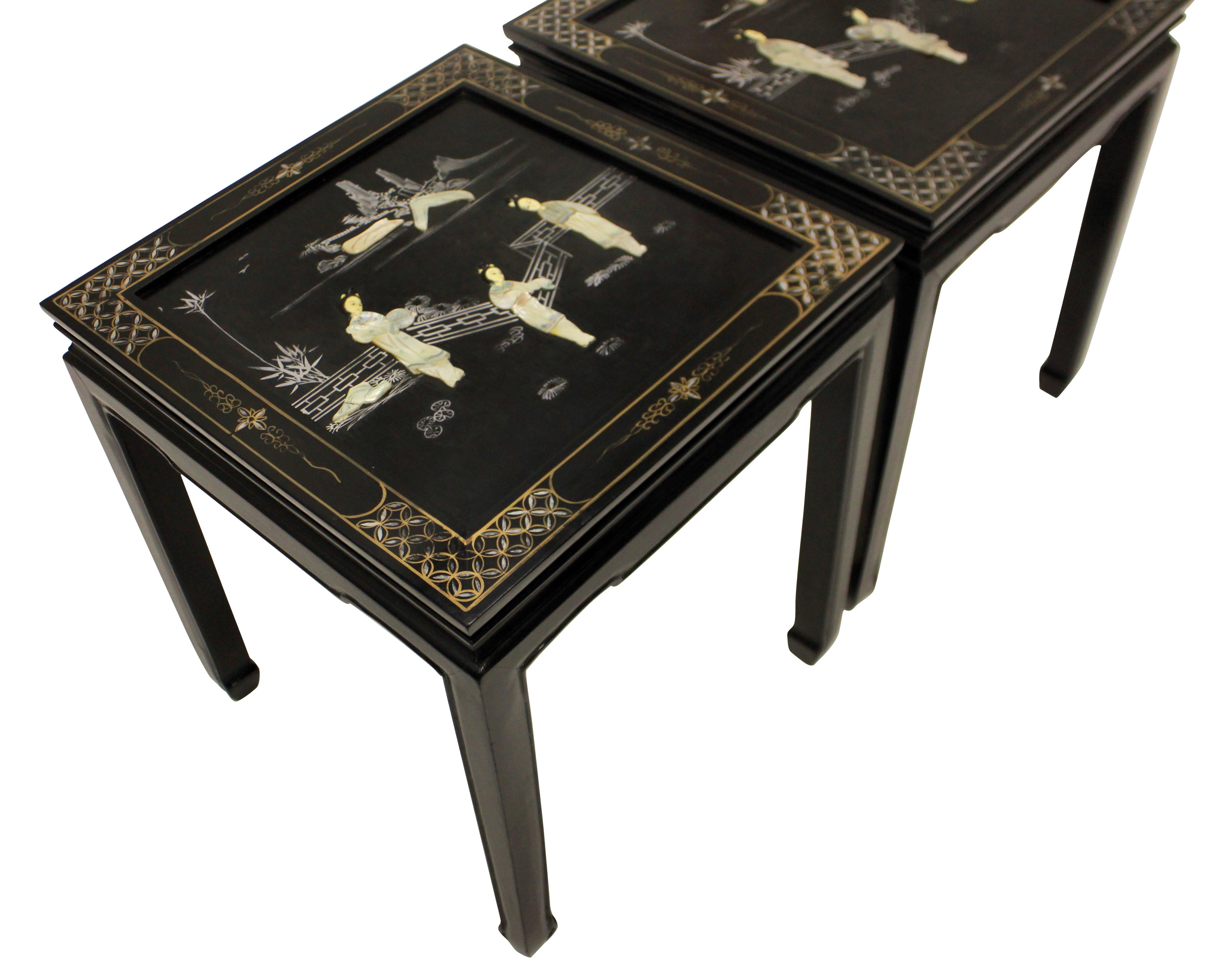 A pair of French Japanned side tables in black lacquer with ivory and mother of pearl detail.