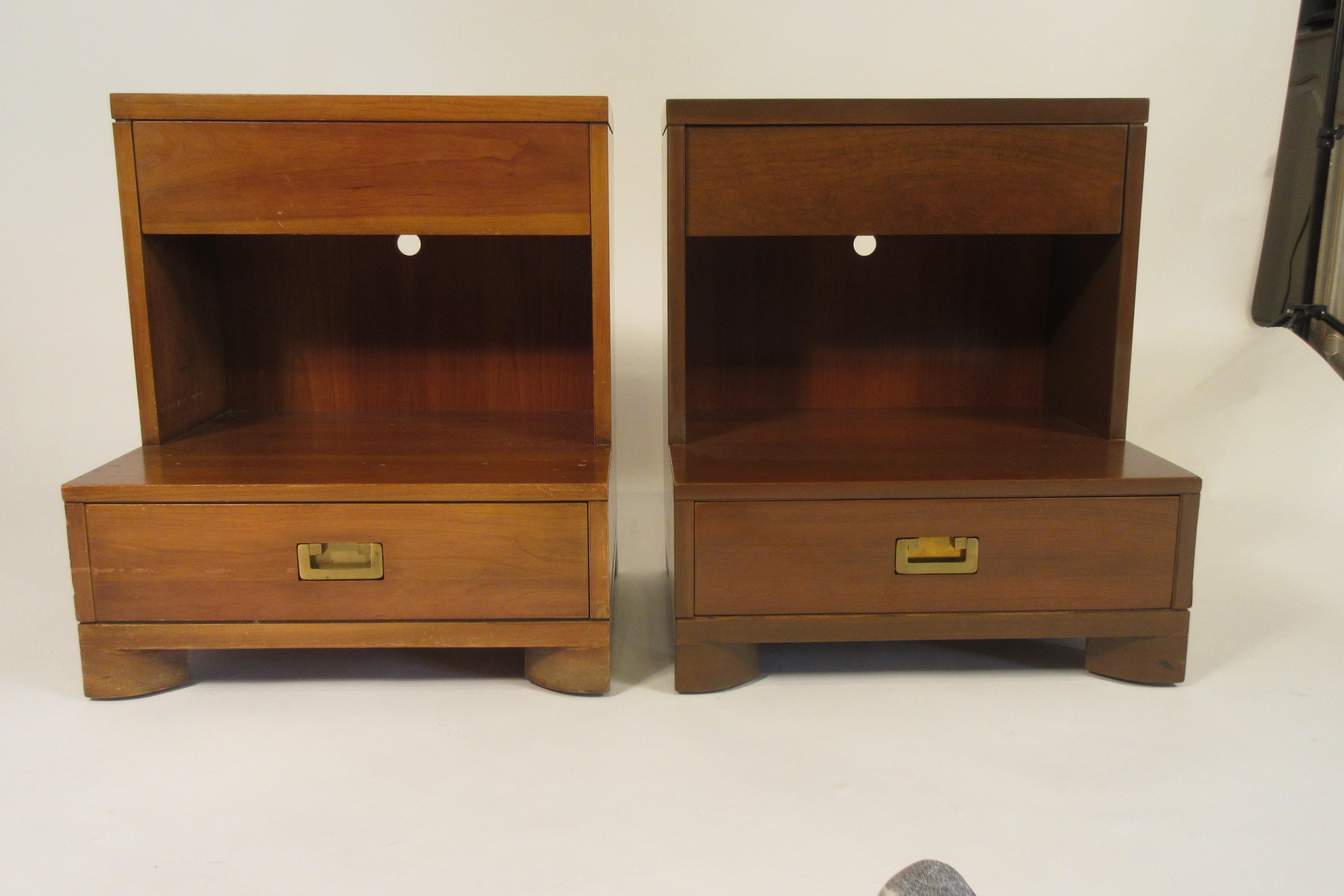 Pair of 1950s Widdicomb end tables (night stands). Brass hardware. Needs refinishing. There was a hole cut in the back of each back board.