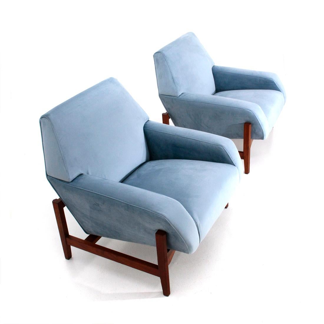Pair of armchairs produced by Gilberto Cassina in the 1950s, designed by Attilio Allievi.
Solid wood base.
Wooden structure padded and lined with new light blue velvet fabric.
Good general condition, some signs due to normal use of