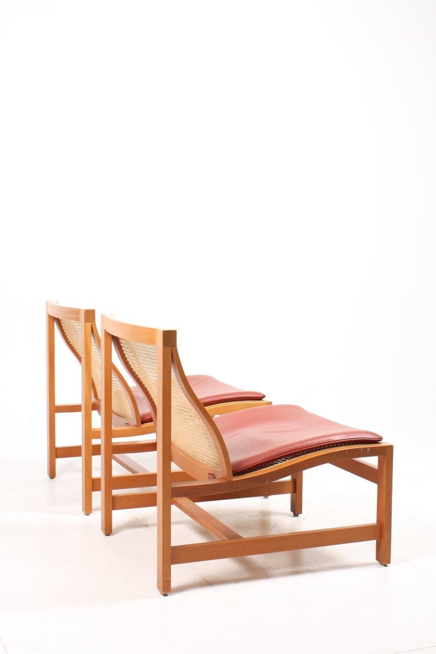Cane Pair of Midcentury Lounge Chairs by in Beech and Patinated Leather, Danish