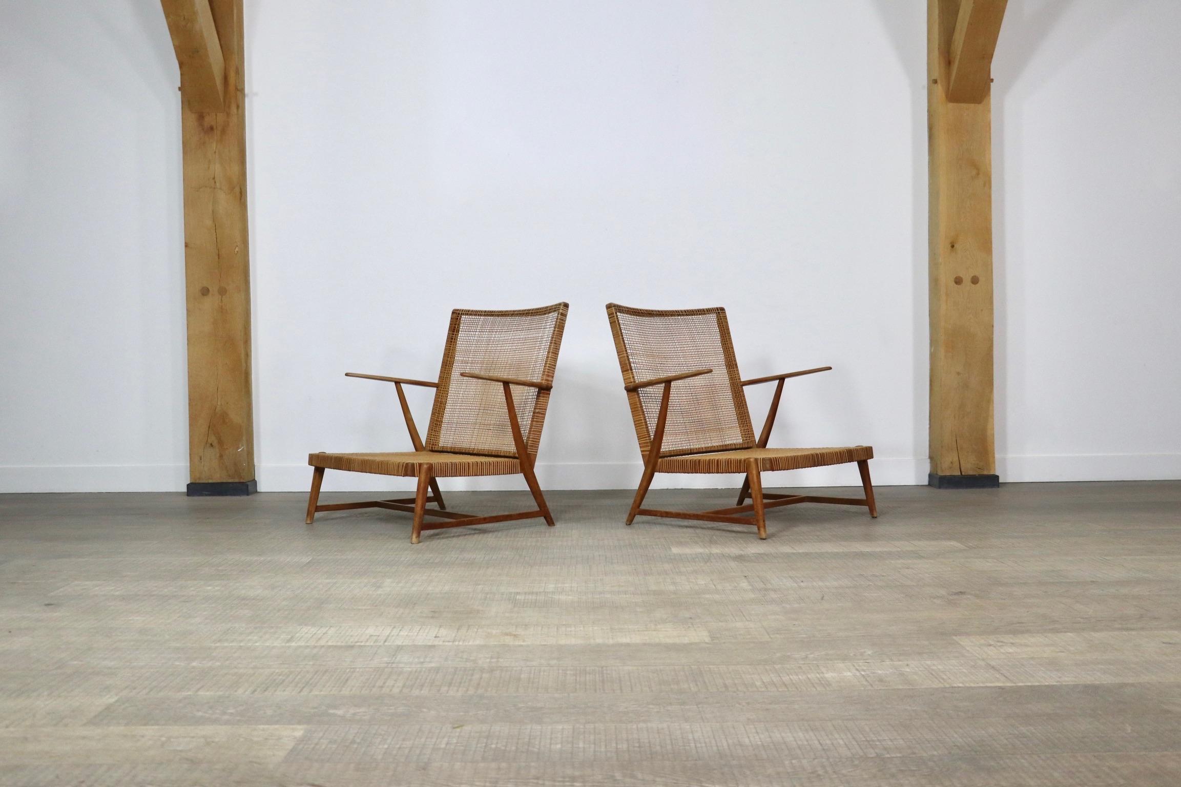 Pair of Midcentury lounge chairs in oak and cane, Germany, 1950s 9