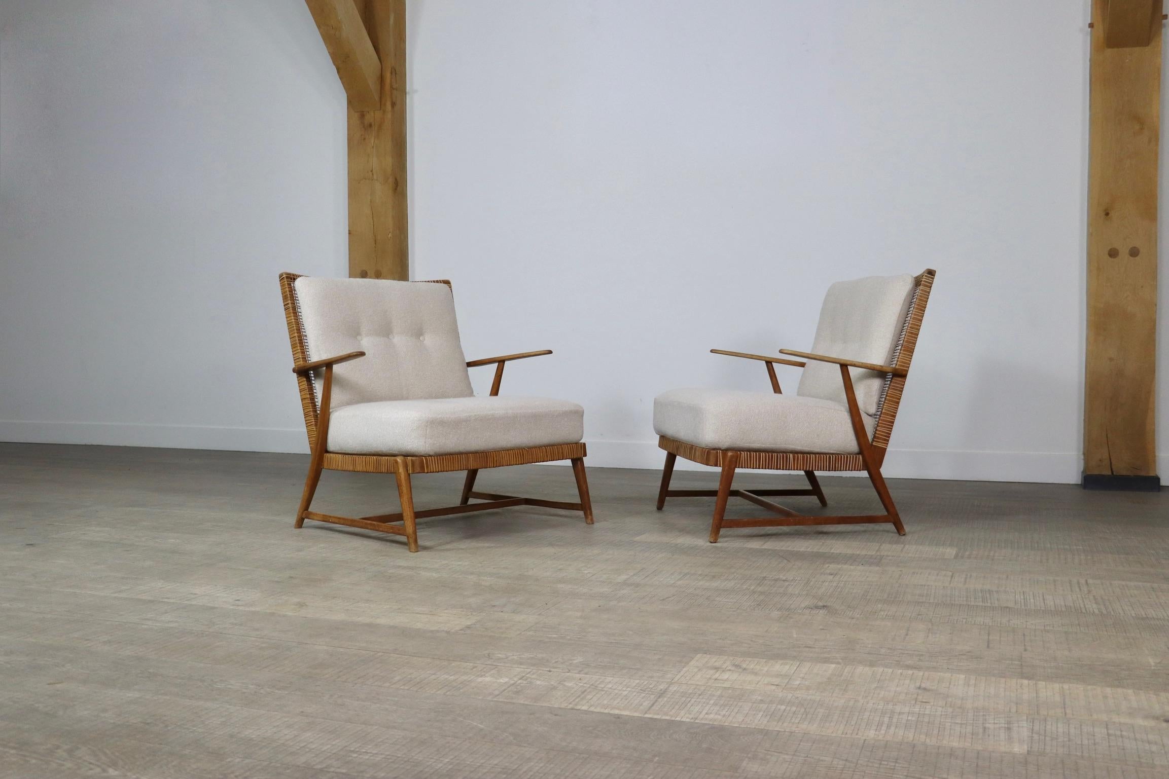Pair of Midcentury lounge chairs in oak and cane, Germany, 1950s 1