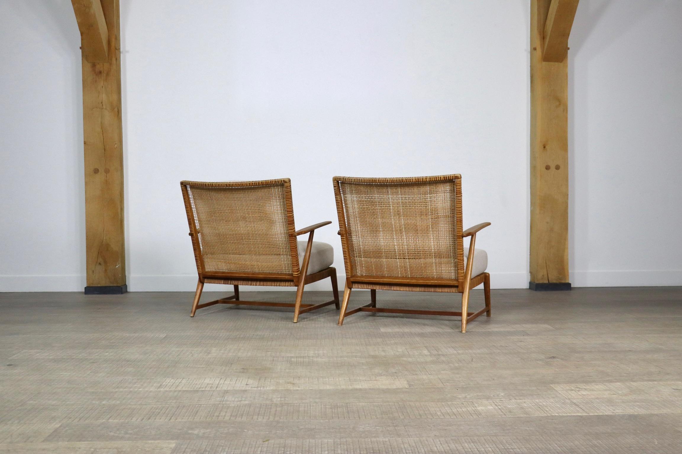 Pair of Midcentury lounge chairs in oak and cane, Germany, 1950s 4