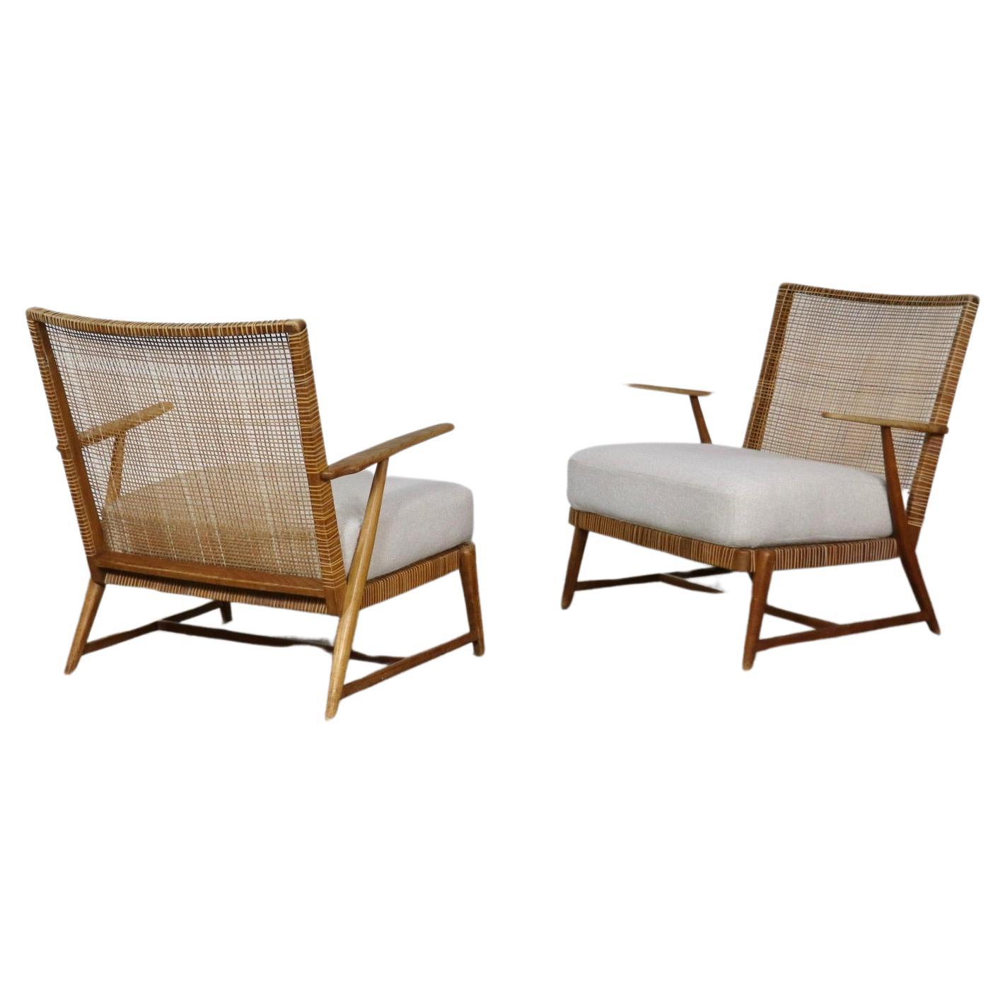 Pair of Midcentury lounge chairs in oak and cane, Germany, 1950s