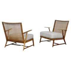 Pair of Midcentury lounge chairs in oak and cane, Germany, 1950s