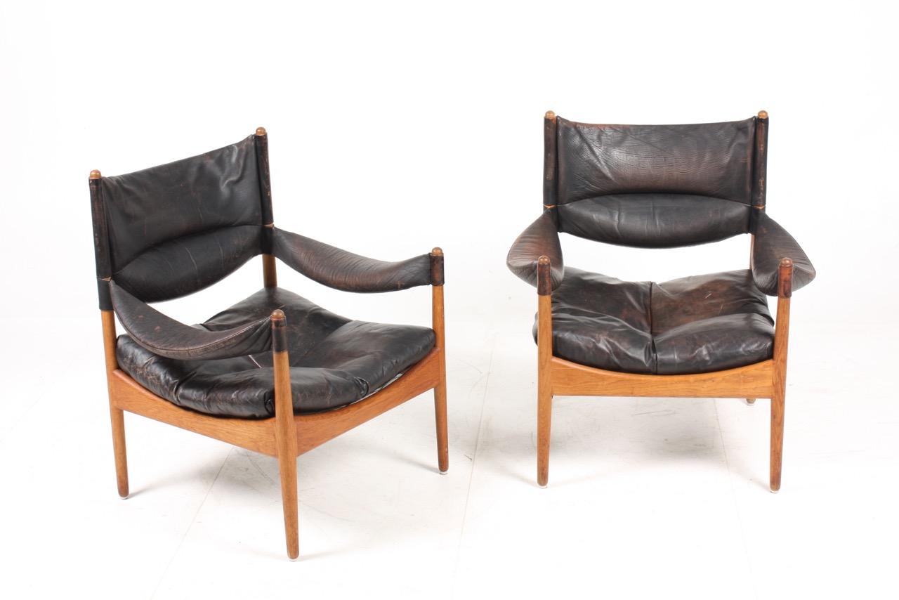 Scandinavian Modern Pair of Midcentury Lounge Chairs in Oak and Patinated Leather, Denmark, 1960s