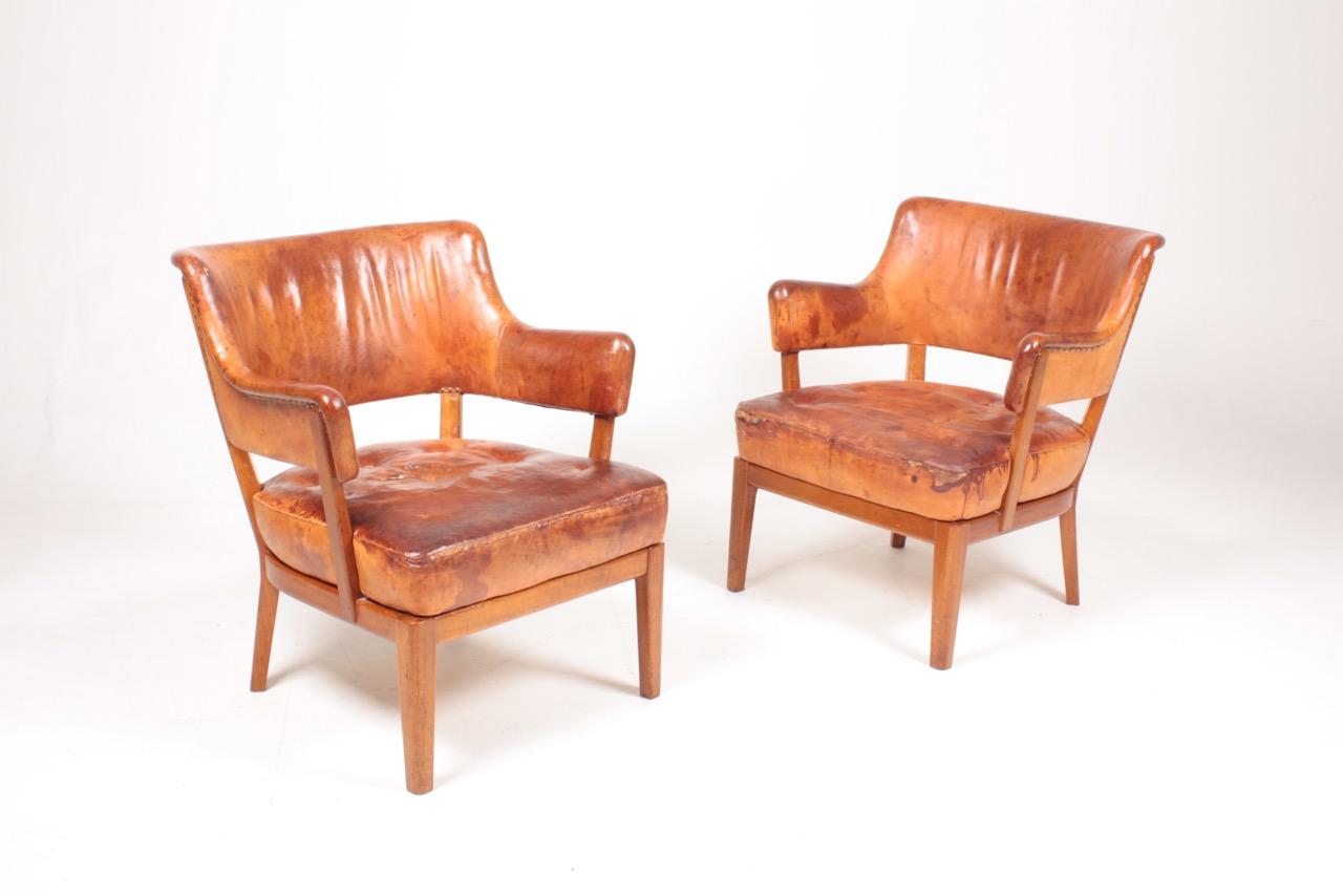 Scandinavian Modern Pair of Midcentury Lounge Chairs in Patinated Leather, 1940s