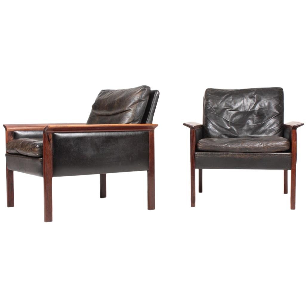 Pair of Midcentury Lounge Chairs in Patinated Leather and Rosewood by Hans Olsen