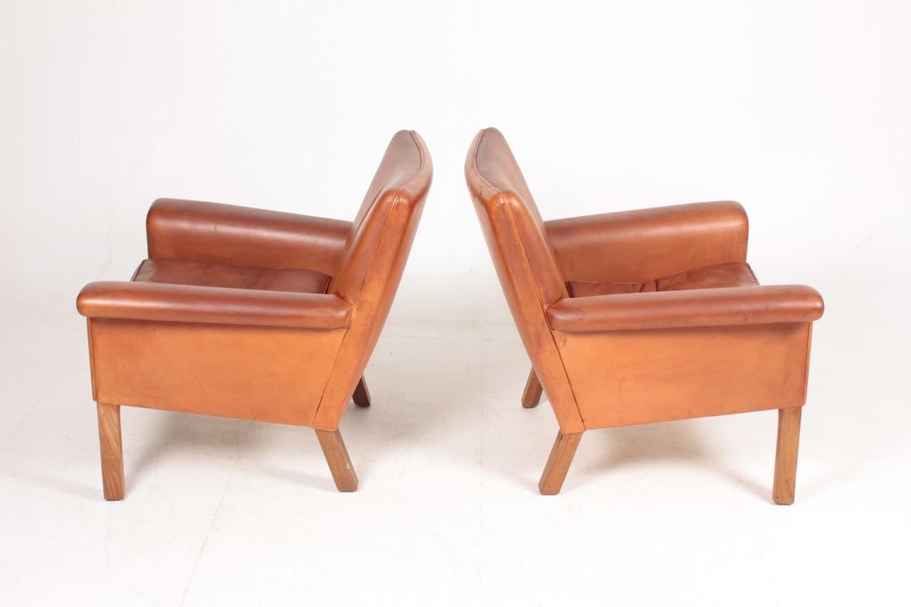 Pair of Midcentury Lounge Chairs in Patinated Leather by Hans Wegner, 1960s 6