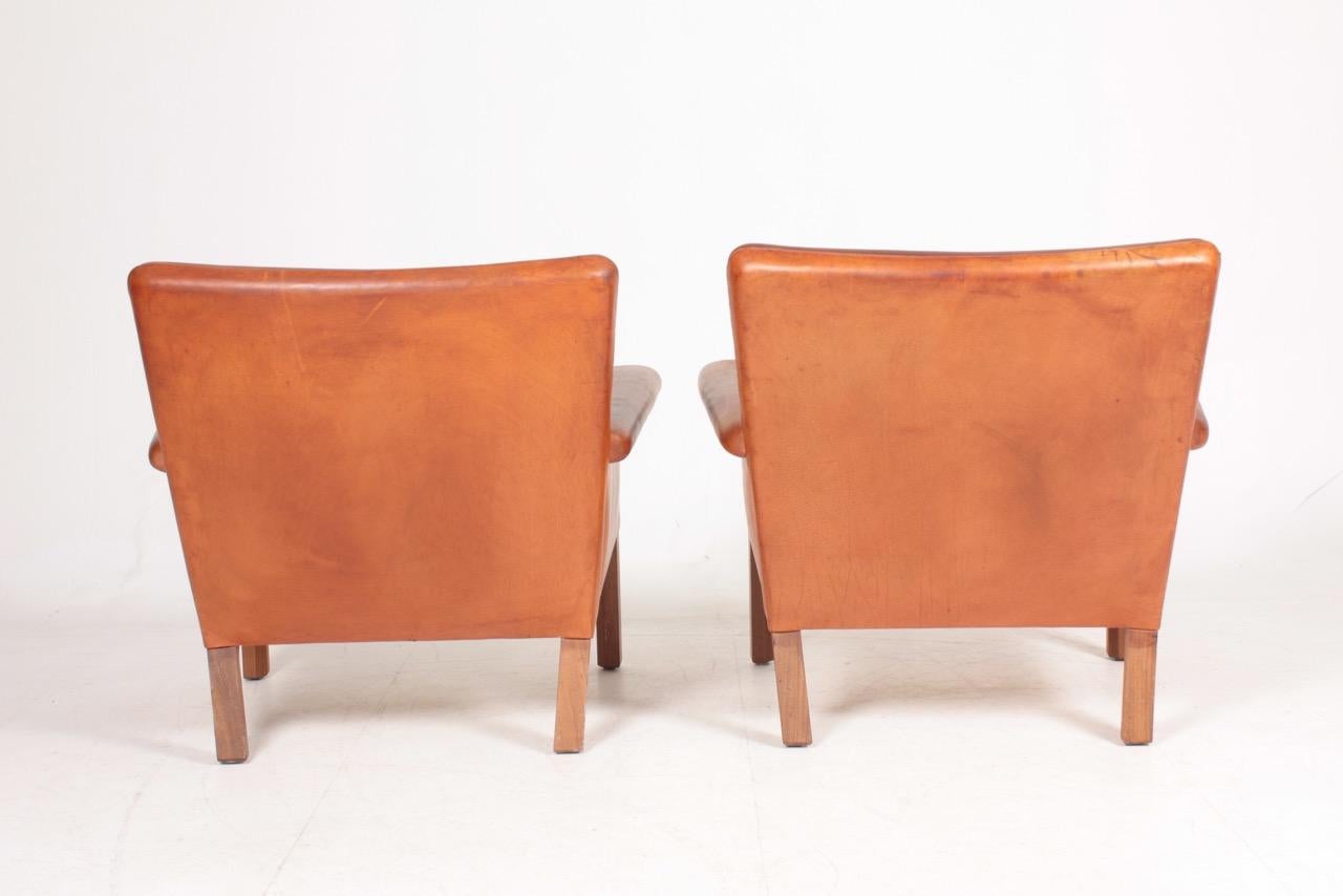 Pair of Midcentury Lounge Chairs in Patinated Leather by Hans Wegner, 1960s 7