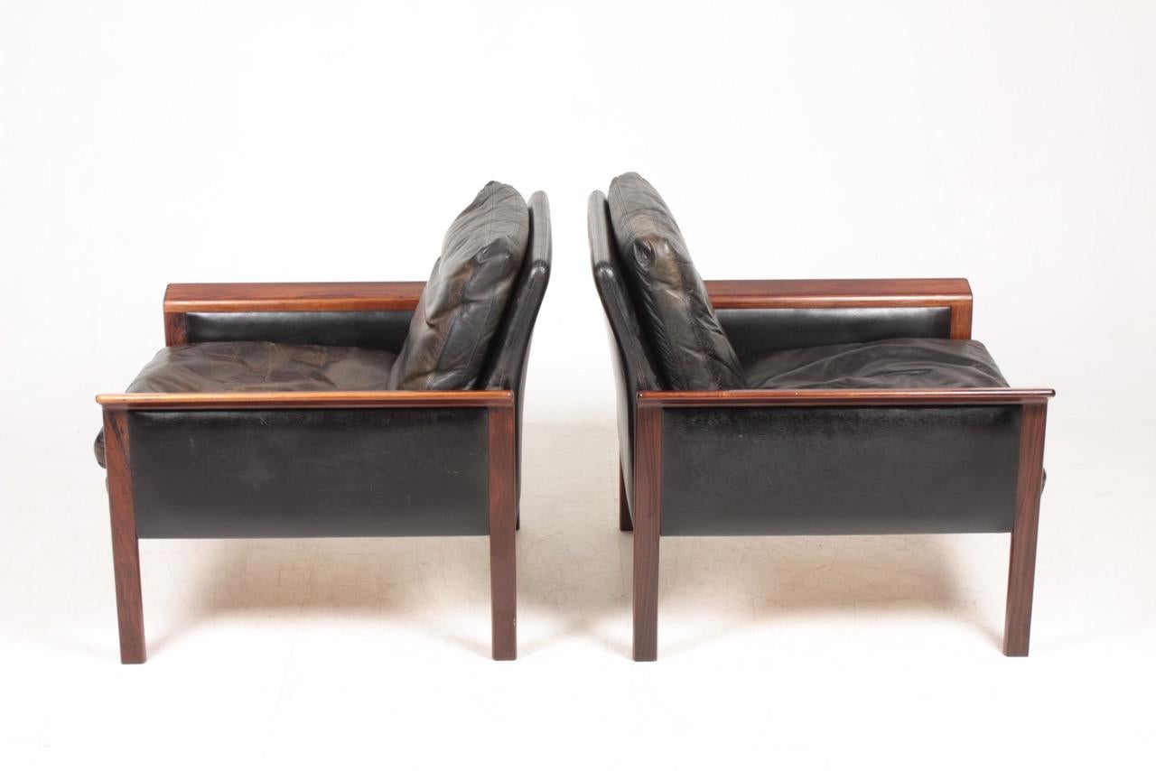 Pair of Midcentury Lounge Chairs in Patinated Leather and Rosewood by Hans Olsen In Good Condition In Lejre, DK