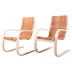 Pair of Midcentury Lounge Chairs in Cane by Alvar Aalto, Finland, 1960s