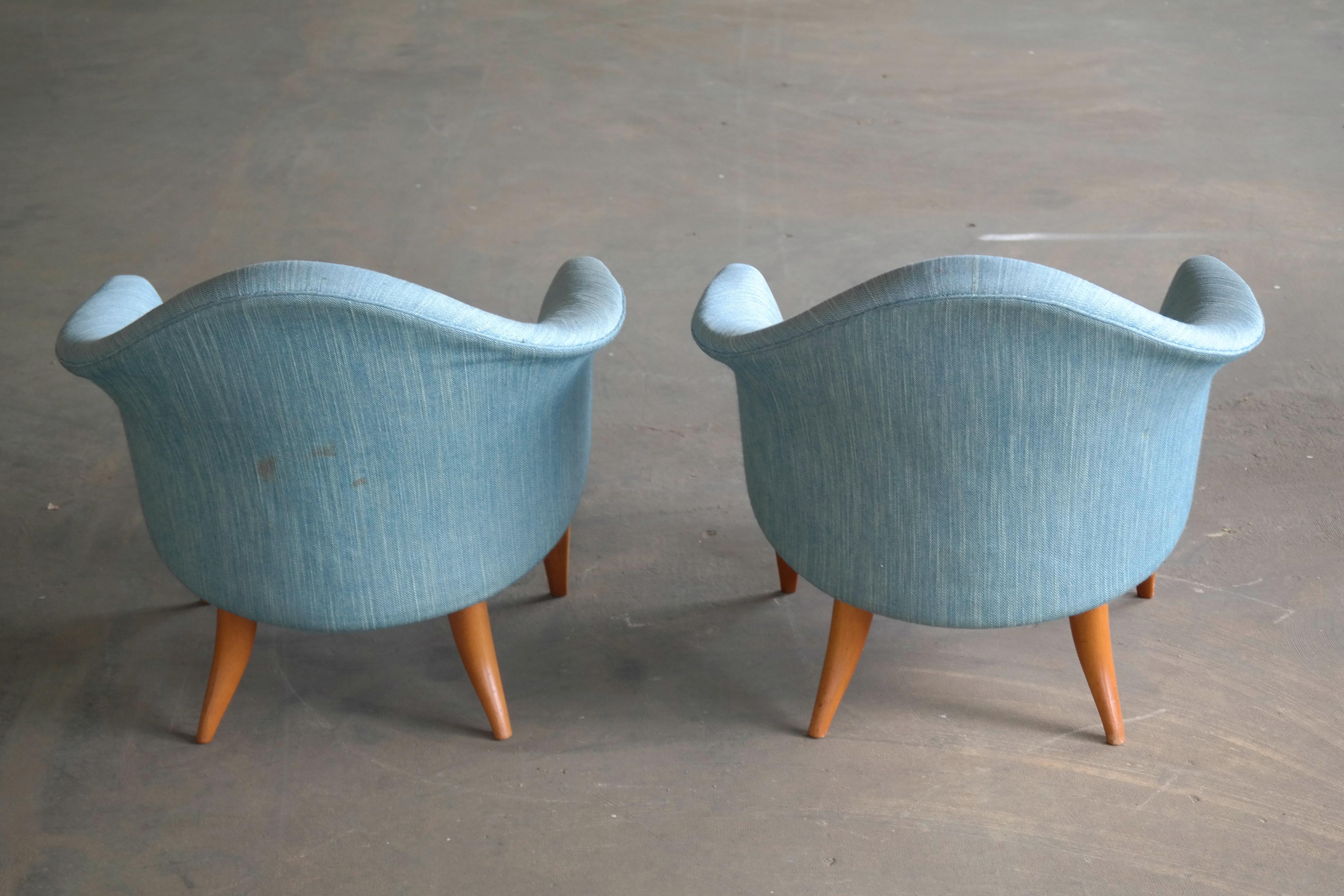 Fantastic pair of lounge chairs designed Model Little Adam by leading Swedish midcentury-era designer, Kerstin Horlin Holmquist. The chairs were part of a design-series named 