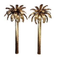 Pair of Midcentury Maison Jansen wall lamps, gilt brass in the shape palm tree