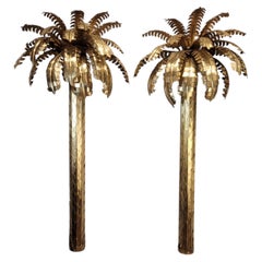 Pair of Midcentury Maison Jansen wall lamps, gilt brass in the shape palm tree