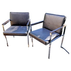 Pair of Mid=Century Modern Black Vinyl and Chrome Paddle Armchairs