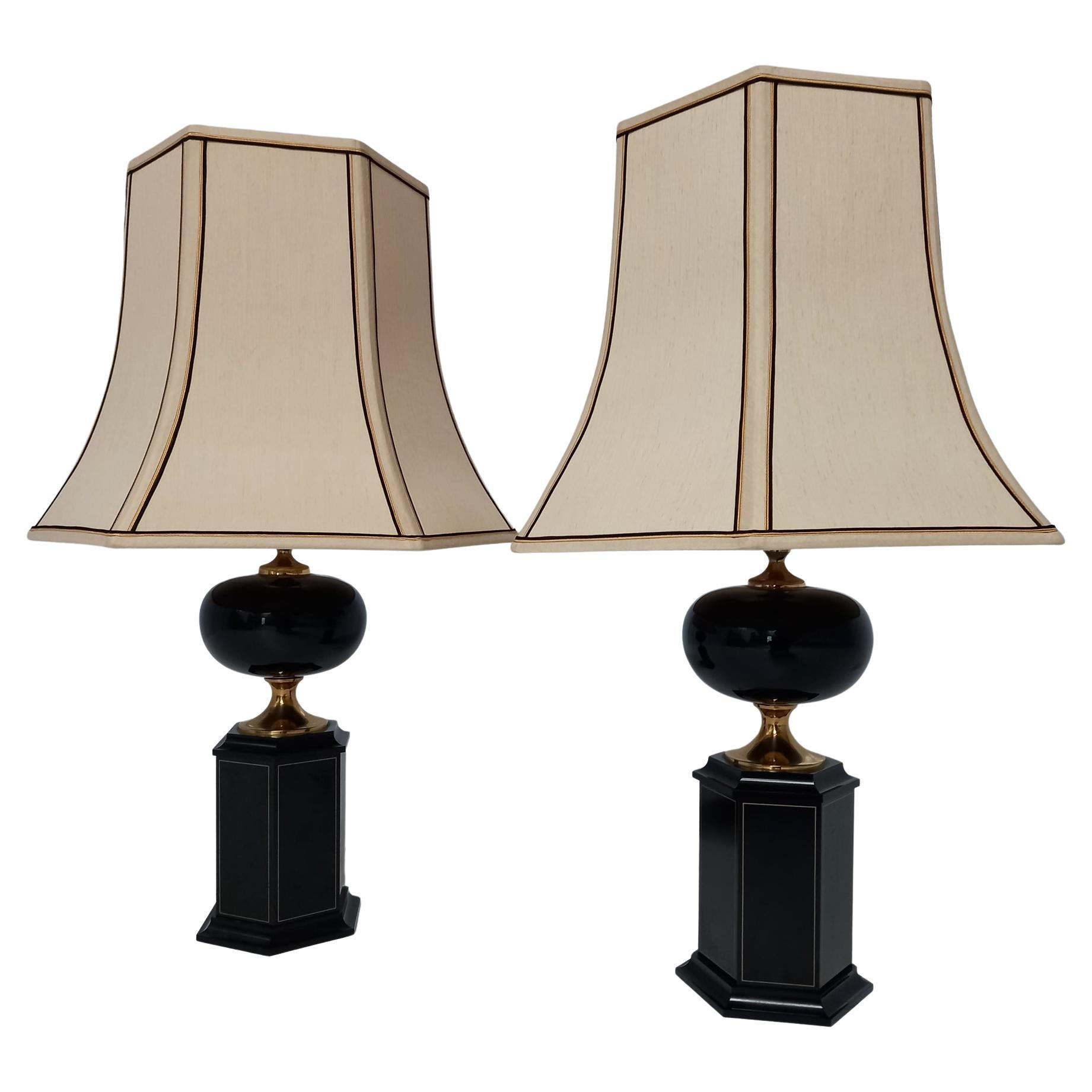 Oversized Maison le Dauphin table lamps, very elegant dark burgundy enamelled with some gold trim on the bases and with brass finishes. - France 1970s. 
Stunning and original lamp shades with gold and black trims. A label is shown at the base of one