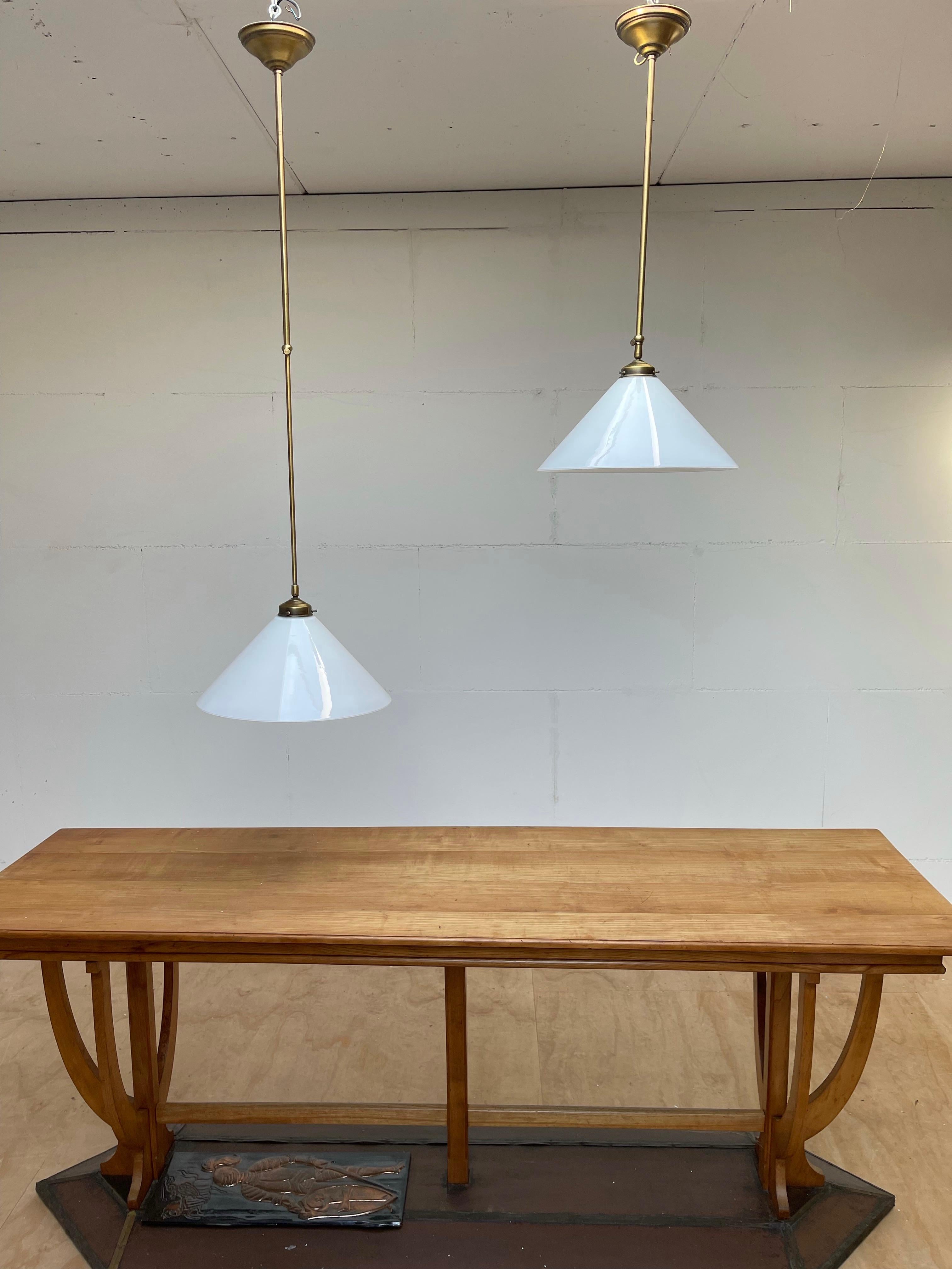 Hand-Crafted Pair of Midcentury Modern Opaline Glass and Brass Adjustable in Height Pendants For Sale