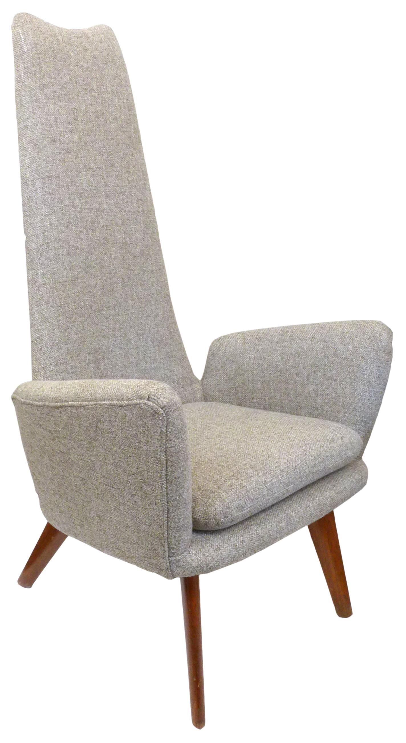 A handsome pair of Mid-Century Modern high-back lounge chairs. Sleek and stylish with expressive, angular lines throughout; an eye-catching silhouette. Great sculptural presence and proportions. Upholstered in a high-quality contemporary textured