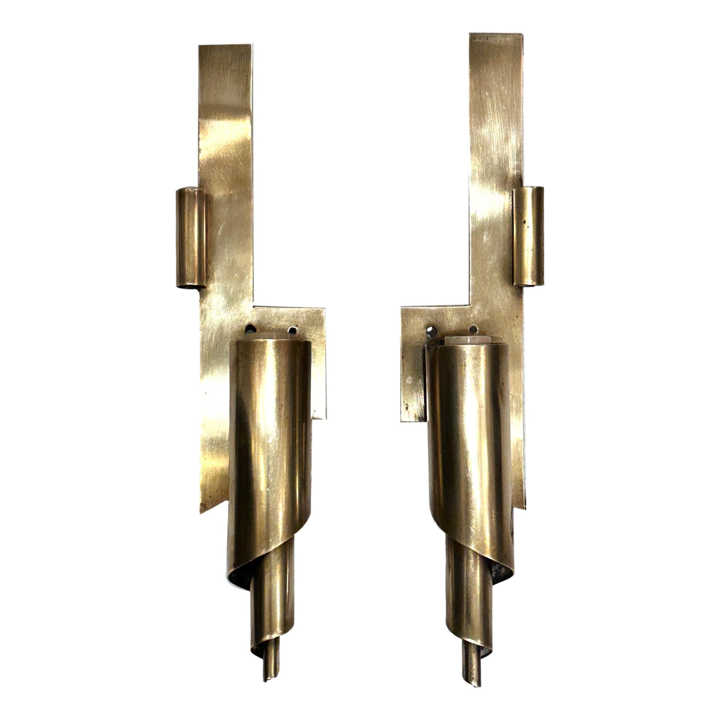 Pair of circa 1950's Italian patinated bronze sconces with single light.

Measurements:
Height: 12.5