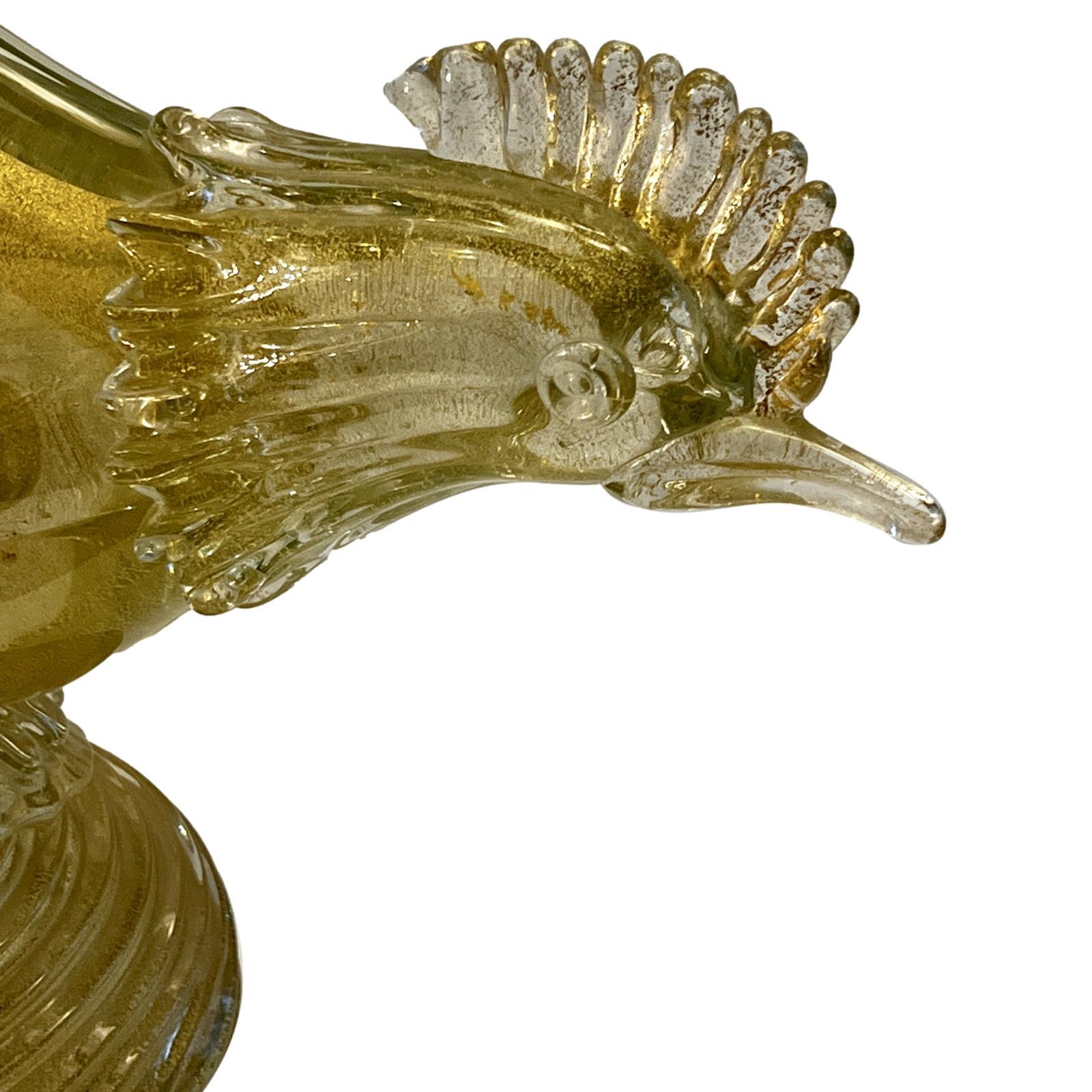 A pair of Italian circa 1960's blown gold and clear glass pheasants.

Measurements:
Height: 19