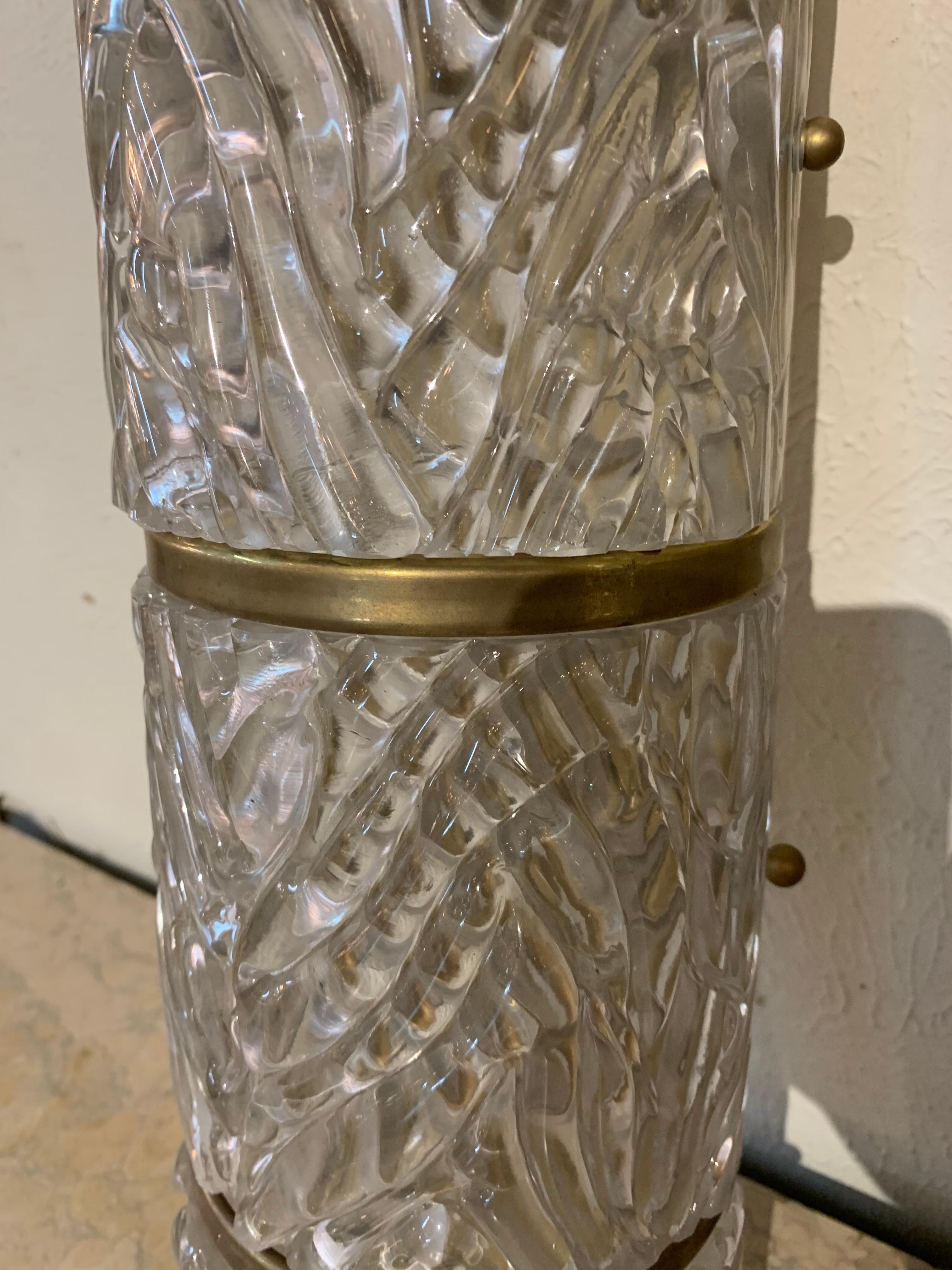 Elegant pair of midcentury barrel form Murano glass and brass sconces. These add a very textural element and create a decorative polished look. So pretty!