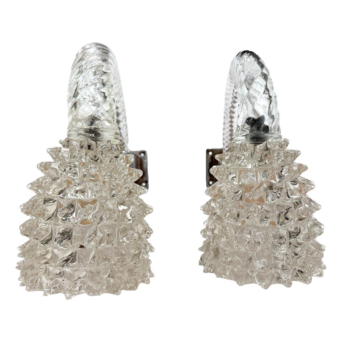 Pair of circa 1950's downlight Clear Murano sconces. 

Measurements:
Height: 10