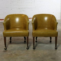 Pair of Midcentury Naugahyde Olive Green Rolling Barrel Chairs Nail Head Accent
