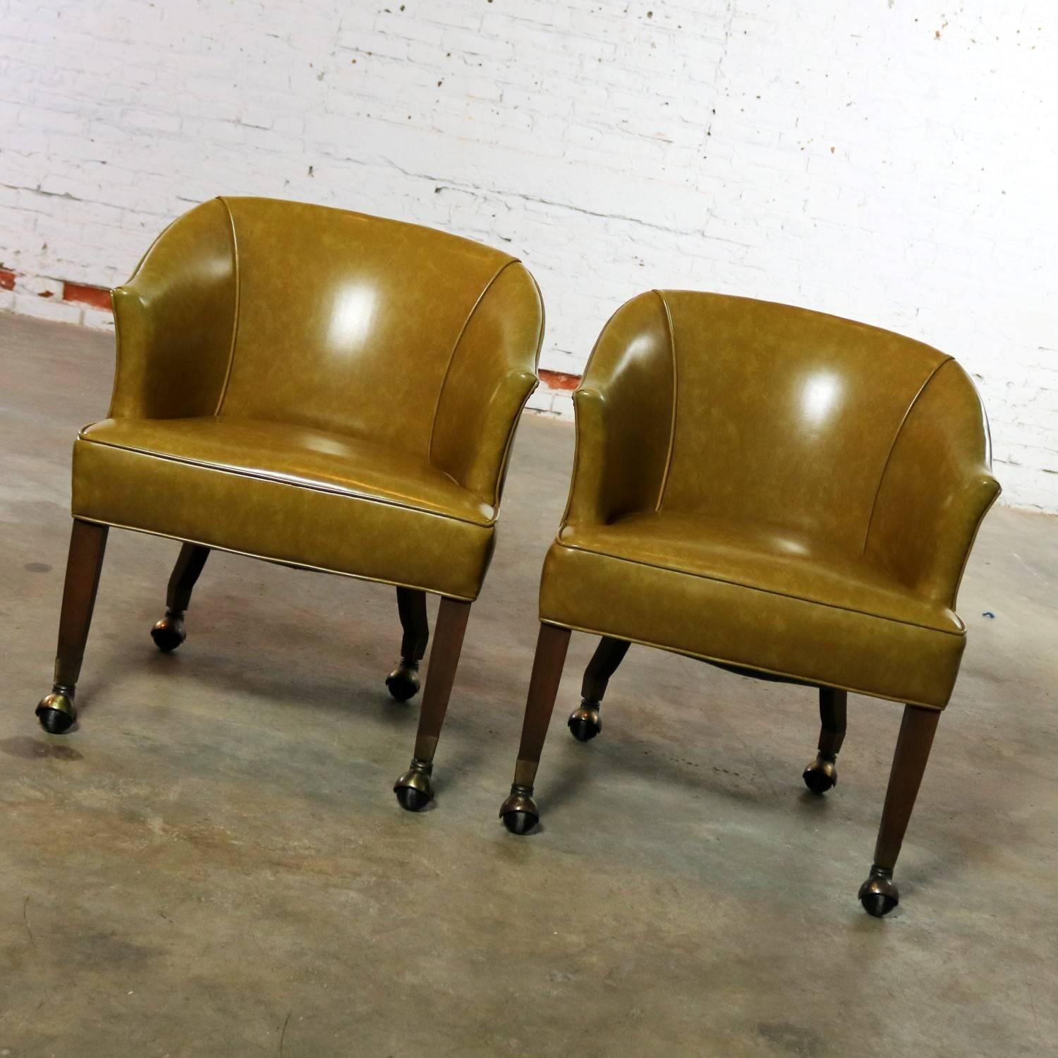 Hollywood Regency Pair of Midcentury Naugahyde Olive Green Rolling Barrel Chairs Nail Head Accent