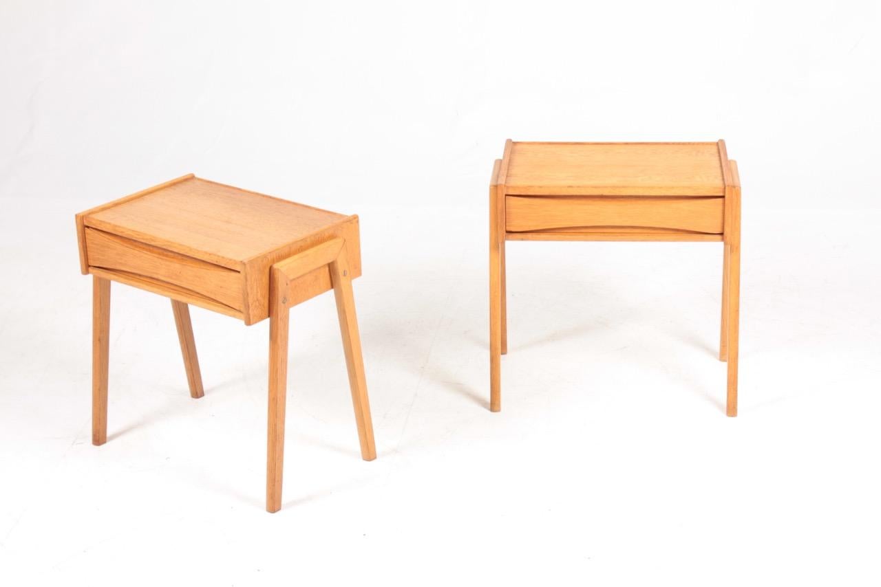 Pair of nightstands in oak designed and made in Denmark 1960s.