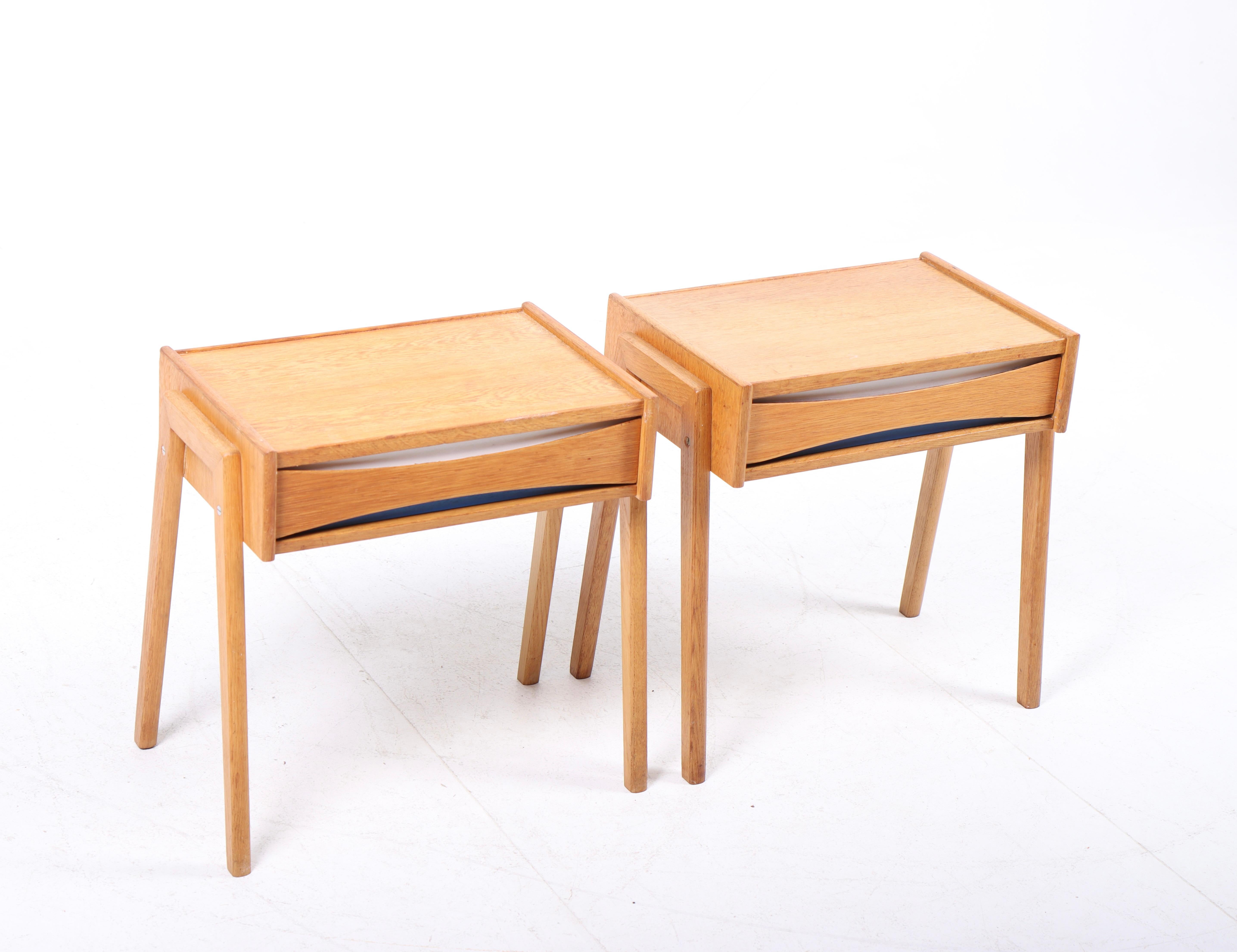 Pair of nightstands in oak designed and made in Denmark 1960s.