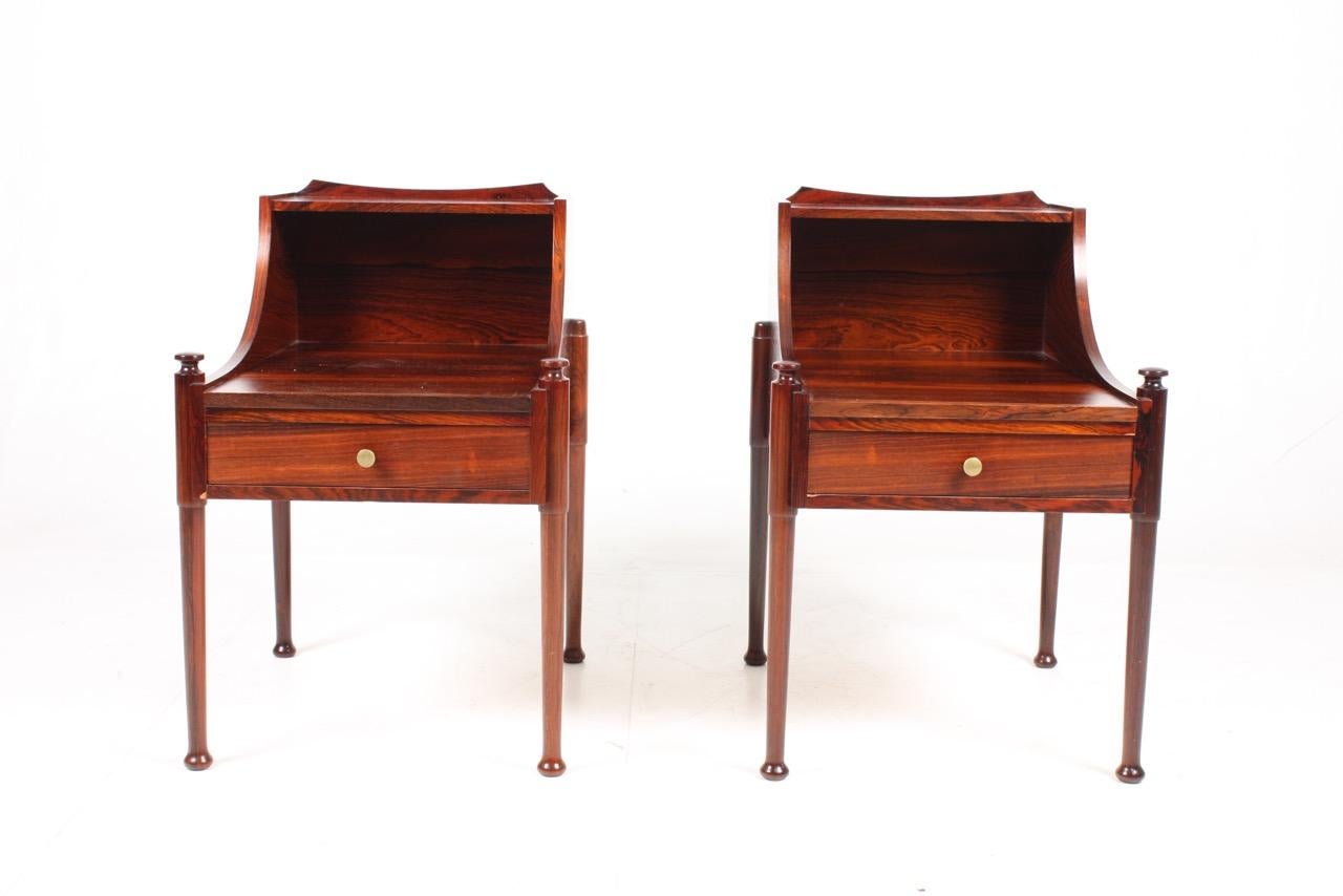 Elegant pair of nightstands in rosewood. Designed and made in Denmark in the 1960s. Great original condition.
 