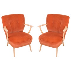 Paar orangefarbene Cocktailsessel aus der Jahrhundertmitte, Deutschland, 1960er Jahre
