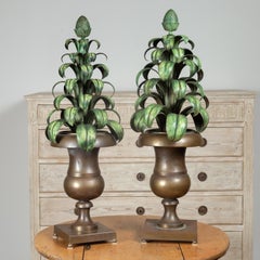 Pair of Midcentury Painted Tole Plants in Brass Posts with Pinecone Finials