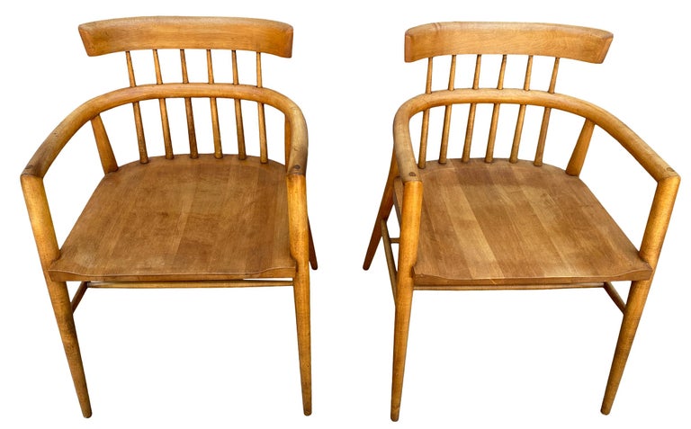 Pair of rare all original midcentury maple Paul McCobb Planner Group Captain arm chairs. Solid maple seat and curved back on tapered legs. Original vintage condition. Original blonde tobacco finish with beautiful patina. These chairs are marked Paul