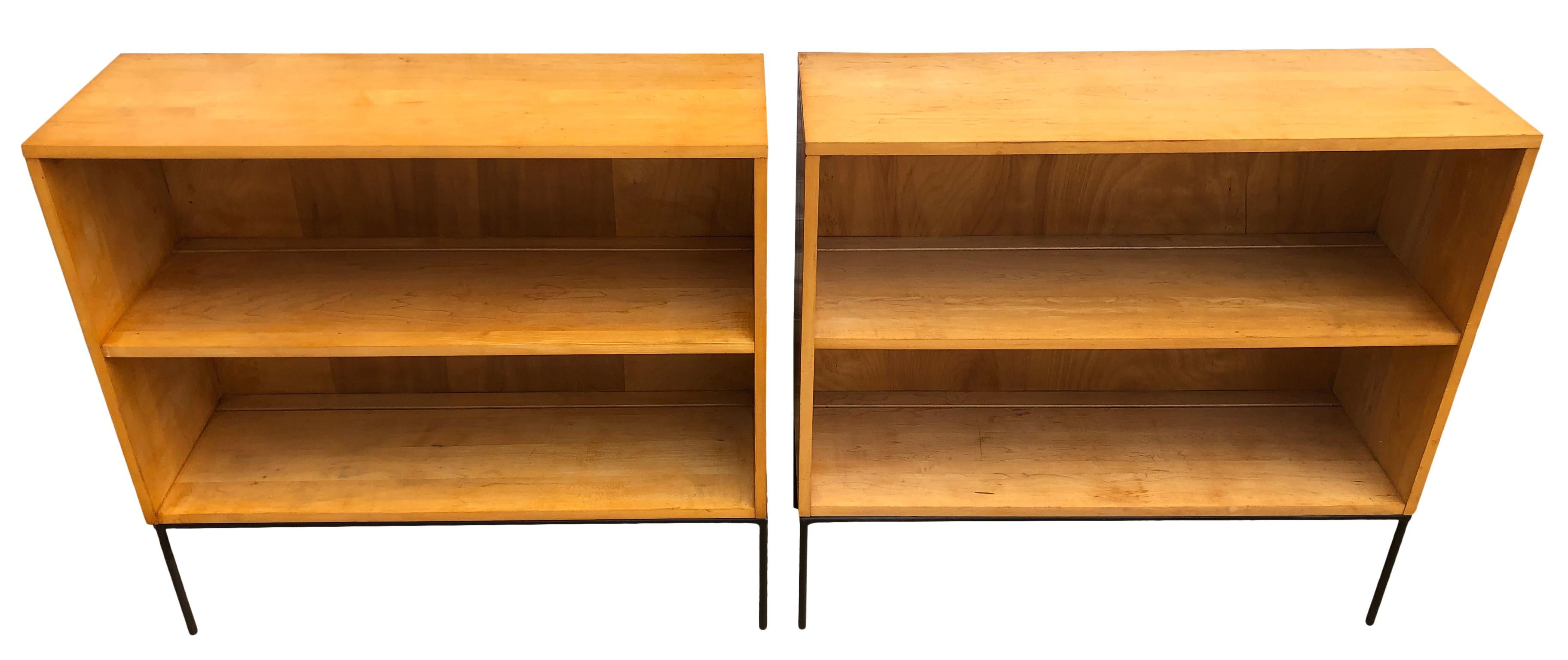 Pair of vintage midcentury super clean Paul McCobb single bookcase #1516 blonde maple finish Iron base. Beautiful bookcase by Paul McCobb, circa 1950s Planner Group, single center fixed shelf, solid maple with blonde. Rare iron base. Clean inside