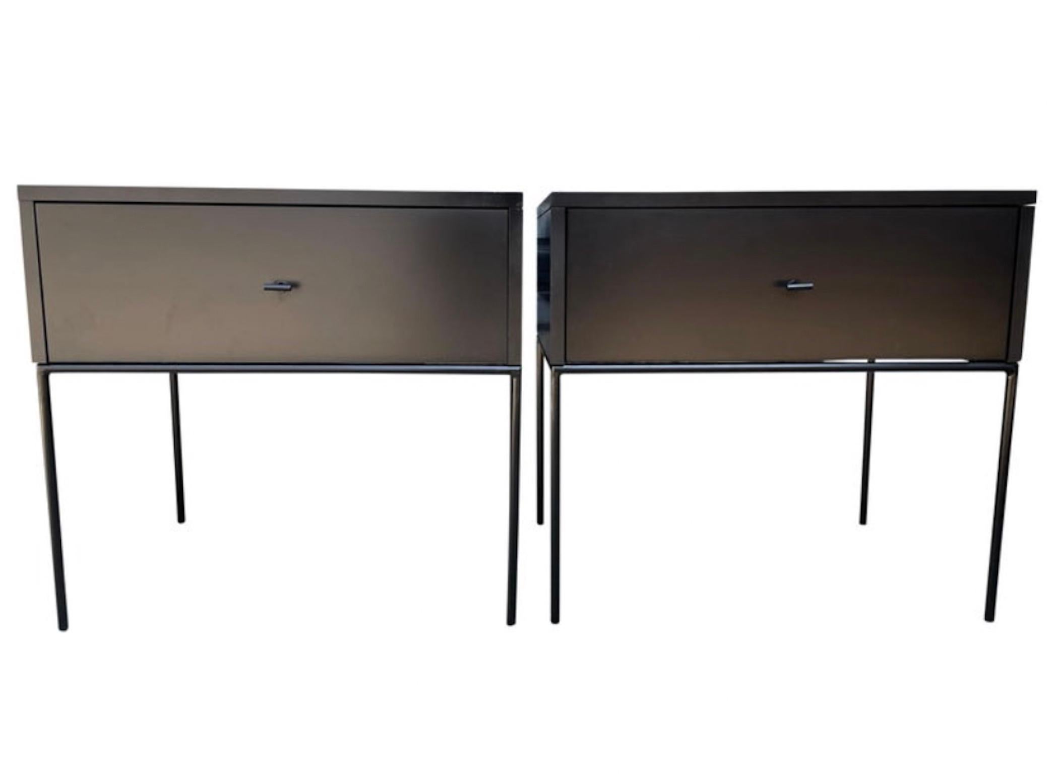 Beautiful pair of Paul McCobb planner group #1500 maple nightstands end tables single drawer. Black T pull knobs. Good vintage condition with Black lacquer finish on maple. Very modern designed pair of nightstands with iron base with 4 legs. All