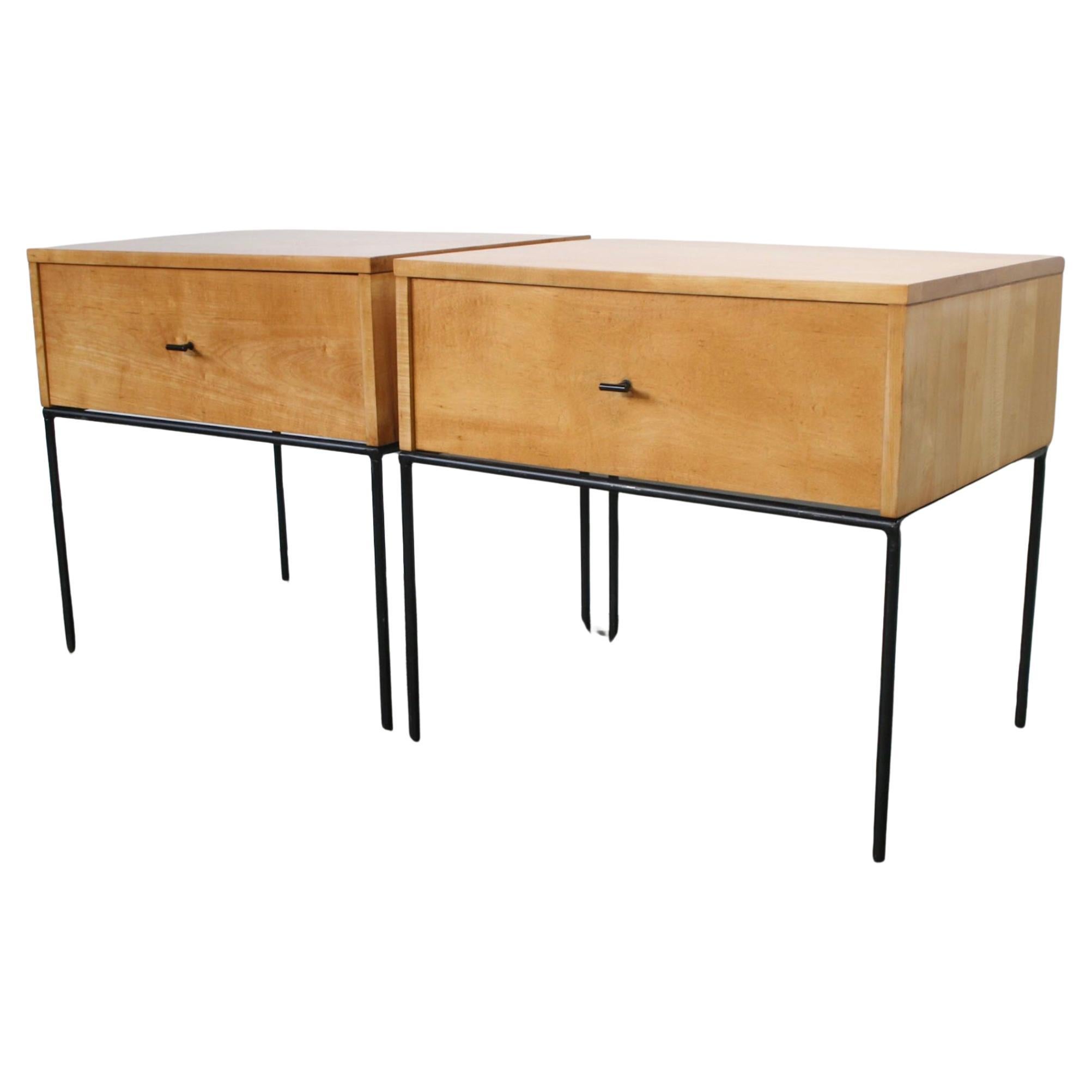 Beautiful pair of Paul McCobb planner group #1500 maple nightstands end tables single drawer. Black T pull knobs. Blonde finish on maple. Very modern designed pair of nightstands with iron base with 4 legs. All solid maple.  Designer Paul McCobb.