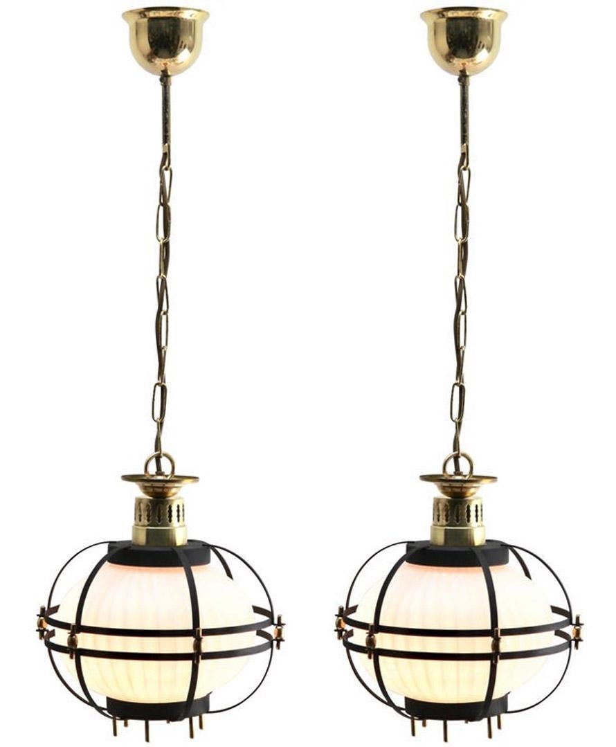 Pair of Midcentury Pendant Lobby Light Forget Metal and Opaline Lampshade

Hanging pendant lights from the 1960s, designed in nautical style by Massive Belgium
with an opaline lampshade
Its Classic modernist form and simplicity in design, making it