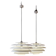 Pair of midcentury pendants by Stilnovo, marked , Italy 1970