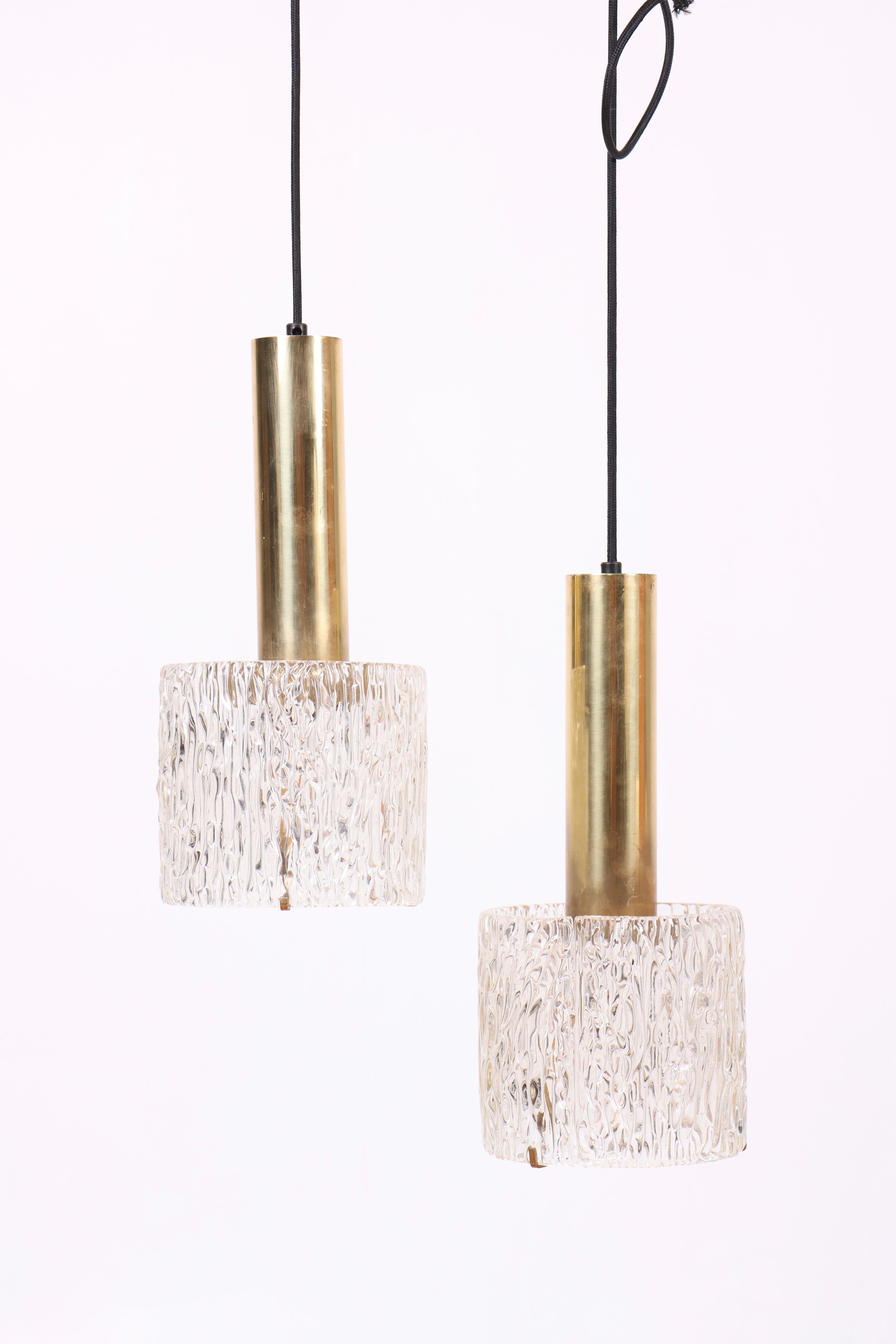 Pair of pendants in glass and patinated brass designed and made in Denmark, Great original condition.
 