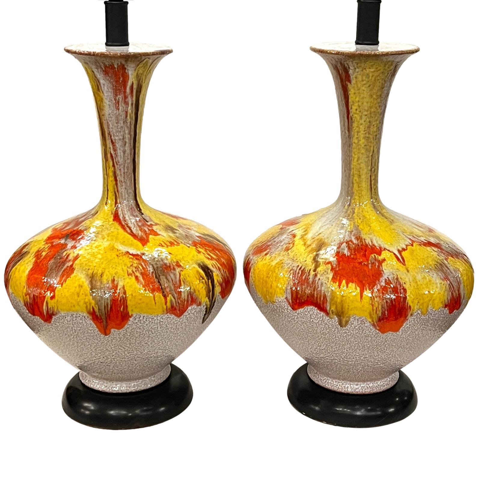 Pair of circa 1960's Italian porcelain lamps with drip-glaze finish.

Measurements:
Height of body: 20