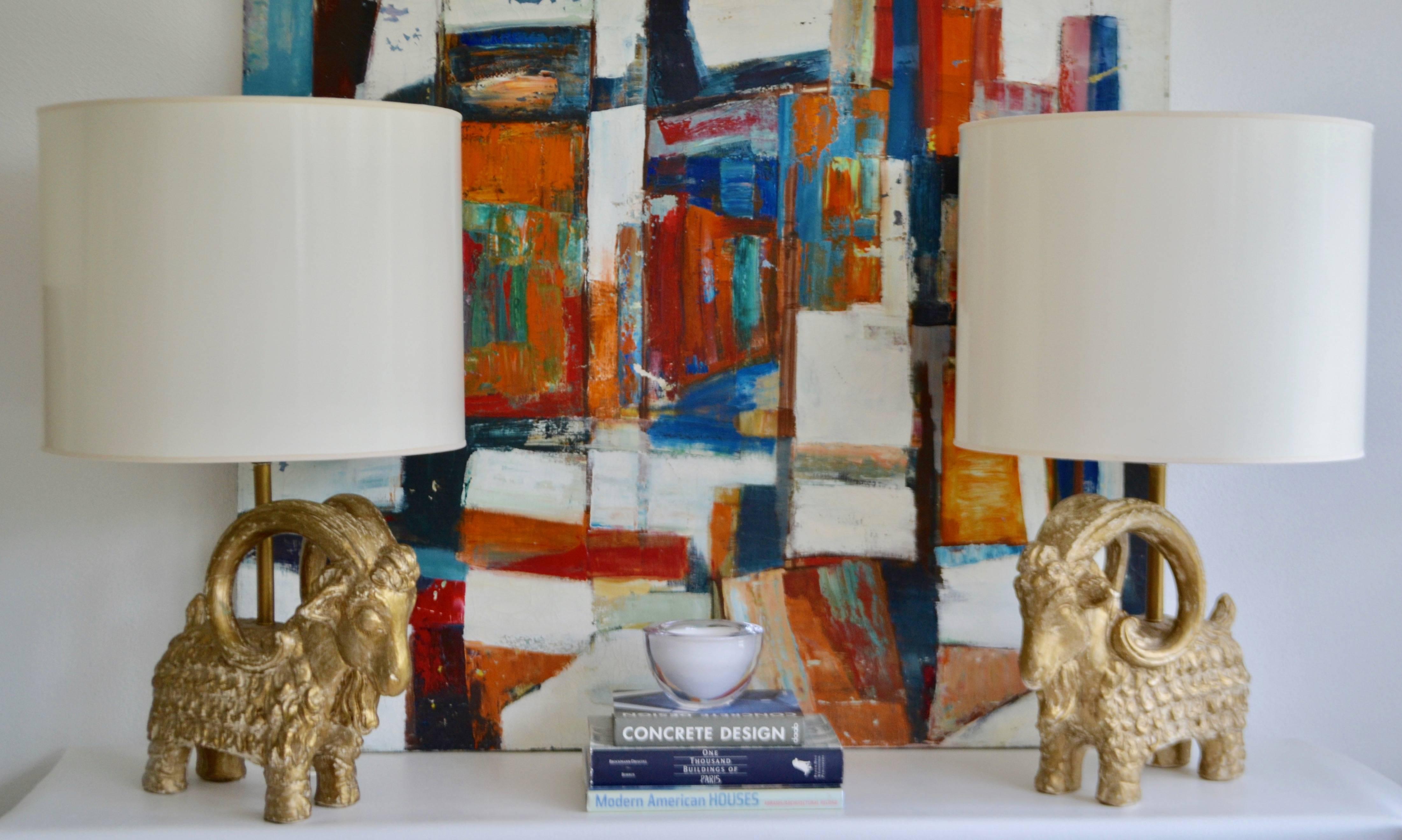 Striking pair of midcentury gilt plaster ram form table lamps, circa 1950s-1960s. Shades not included.
Measurements:
Overall 28.5