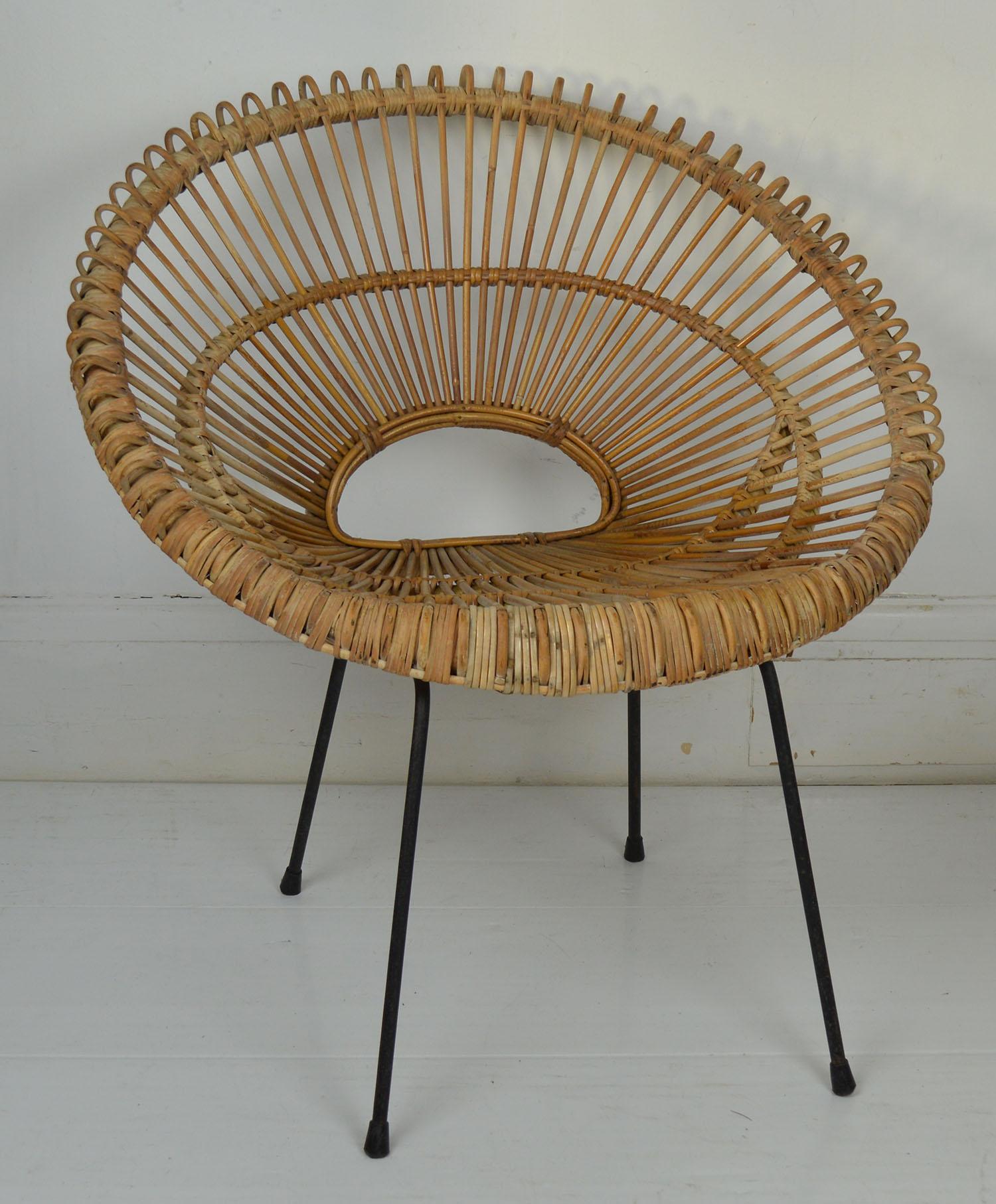 Very stylish pair of chairs.
 
Rattan and wrought iron.

No breaks to the rattan.

 