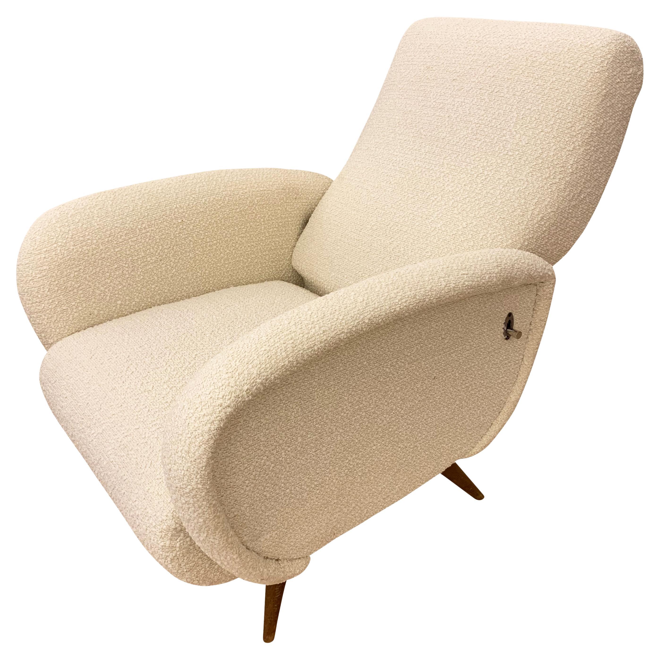 midcentury reclining lounge chairs in the manner of Marco Zanuso. Upholstered in an off-white fabric and with tapering wood legs. Price per pair but can be sold individually on request. Ottomans sold separately for $3,500.00.

Condition: Minor