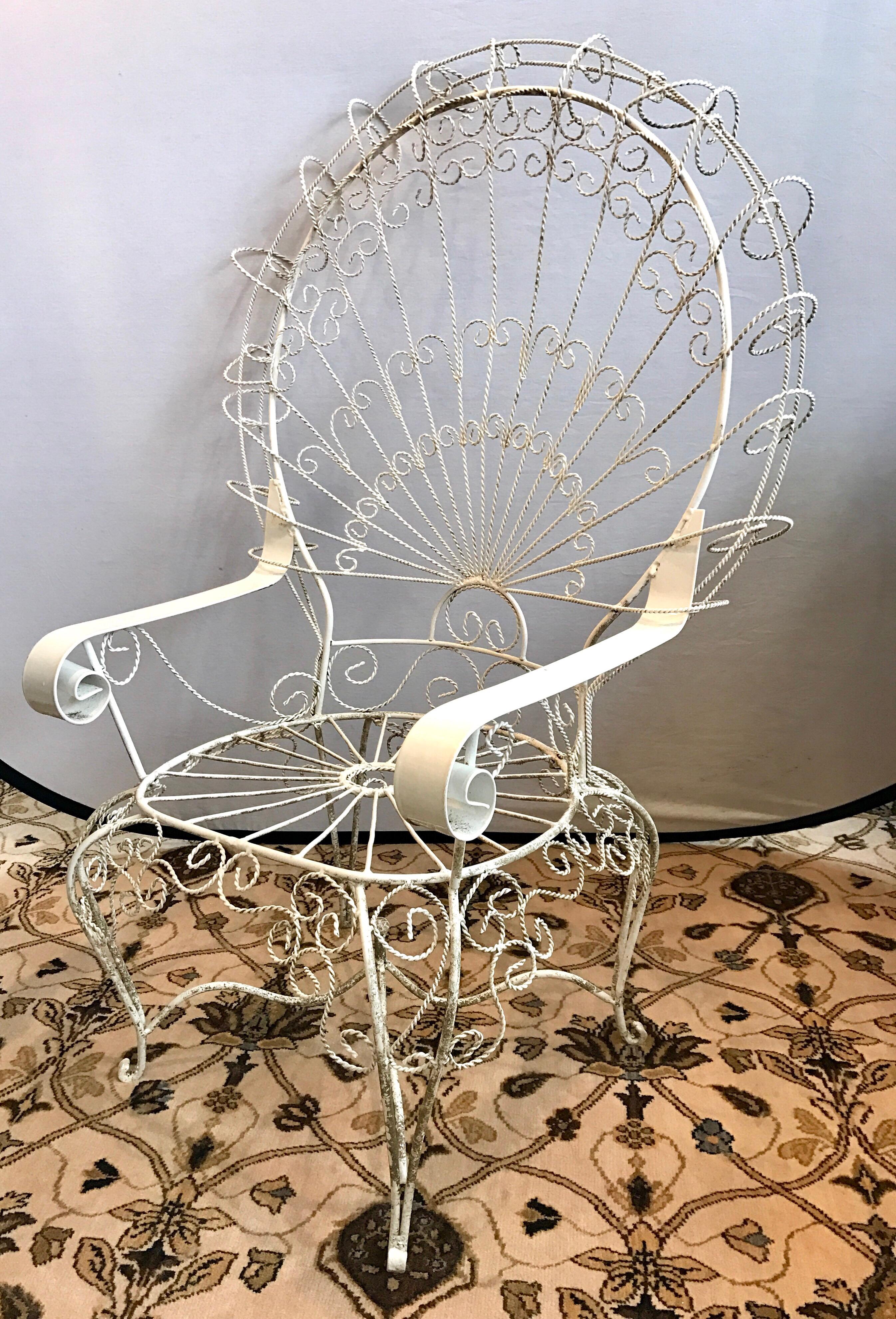 wrought iron peacock rocking chair