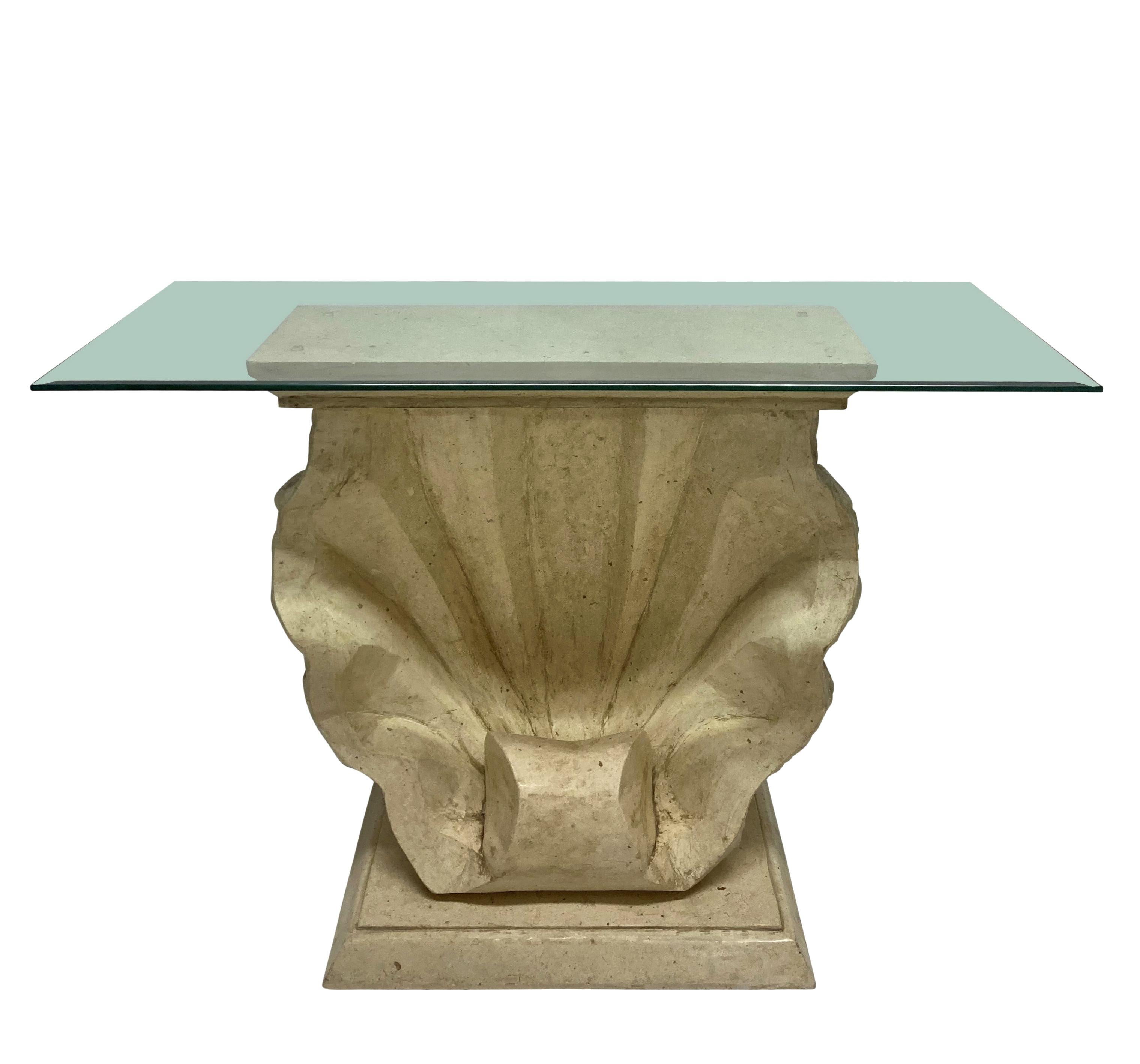 A pair of Large French Mid-Century scallop shell console tables in the manner of Serge Roche. Of stone and plaster with transparent clear bevelled glass tops, the consoles can be reversed and used either way round. The reverse has a much more