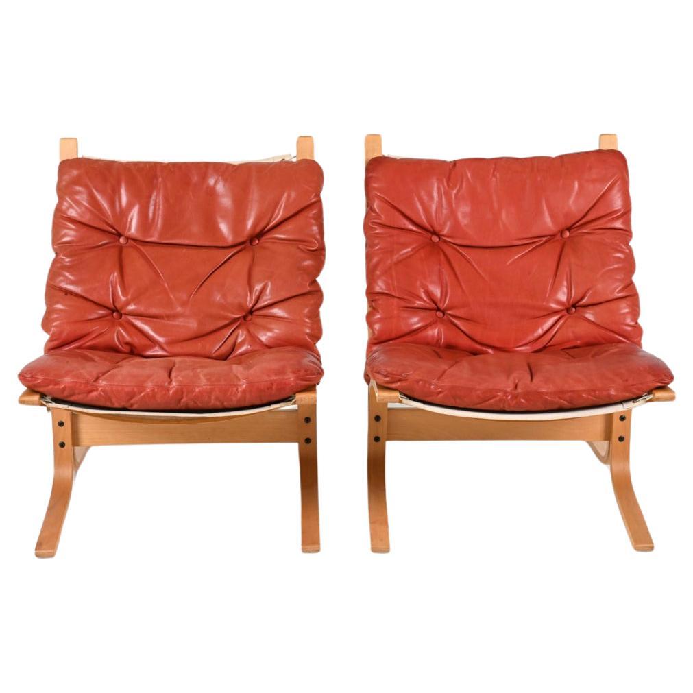 Norvégien Paire de chaises longues Siesta en cuir de style scandinave moderne du milieu du siècle dernier par Westnofa en vente